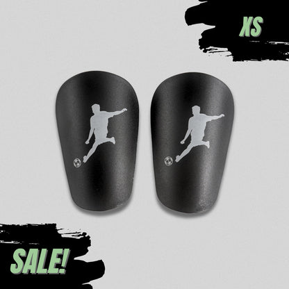 Maestrofootball Maestro™ – Mini-Schienbeinschoner Schwarz XS für Kinder - Fußball